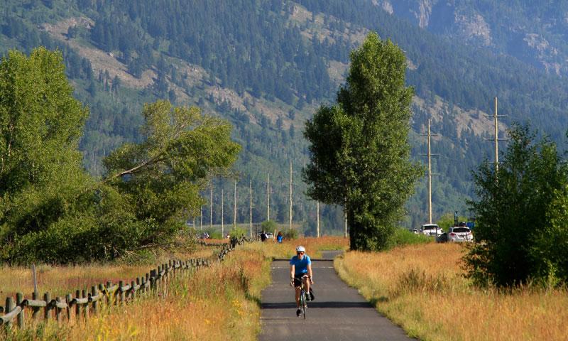 Biking along a Jackson Paved Trail